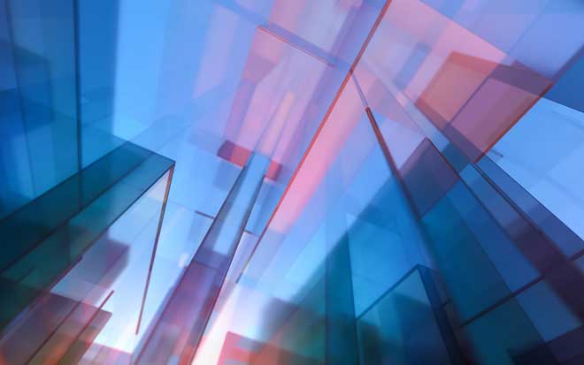 Lit up buildings made of glass are shimmering against light